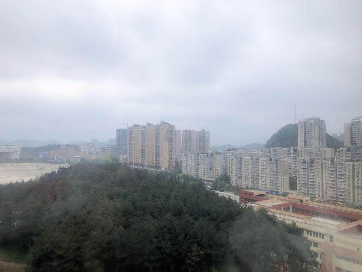 Iu Hotel Guiyang Olympic Sports Center China Resources Vientiane Buitenkant foto